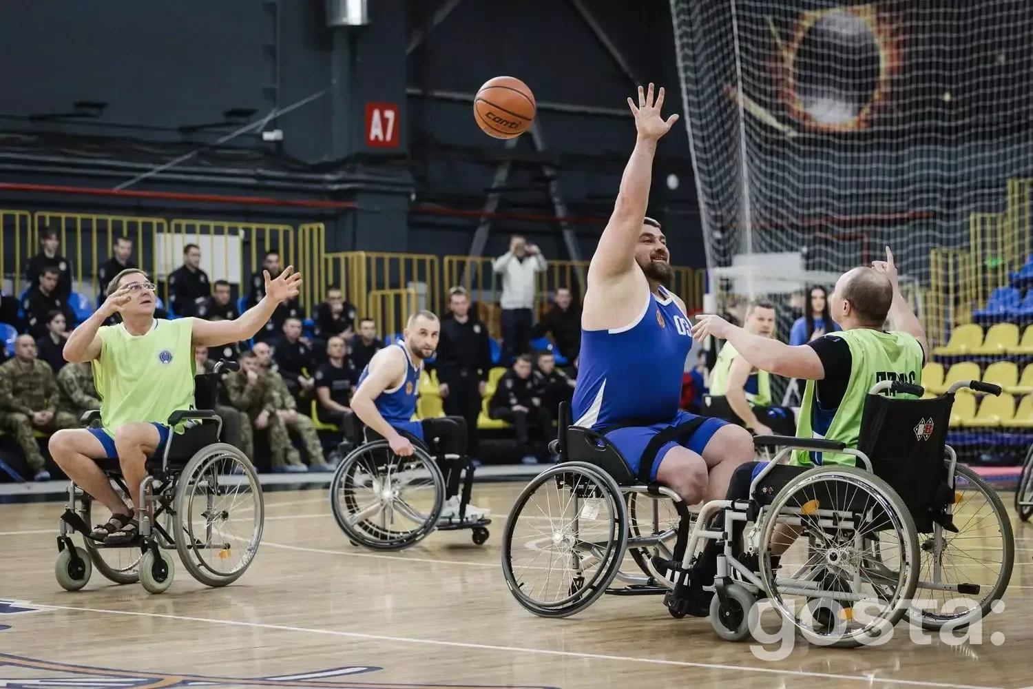 Alt text: "Veterans' Bask basketball team presentation in Dnipro, highlighting adaptive sports for Ukrainian veterans.