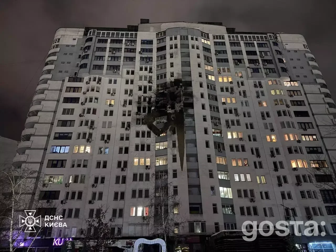 Destruction of a residential building in Kyiv following a Russian attack, highlighting emergency response efforts.