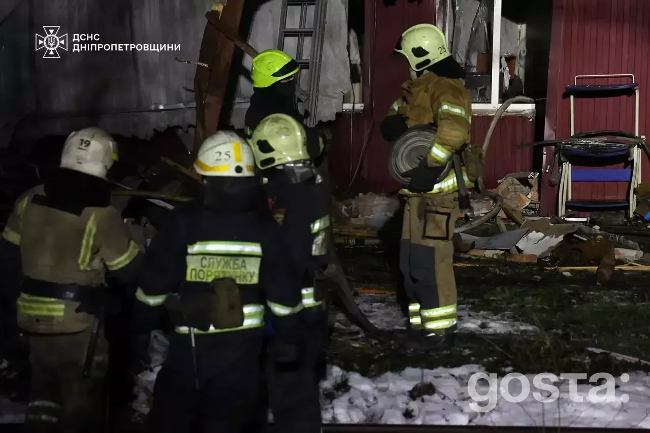 Emergency responders from Ukraine's State Emergency Service extinguishing fires after a missile attack in Dnipro, 7 Janu