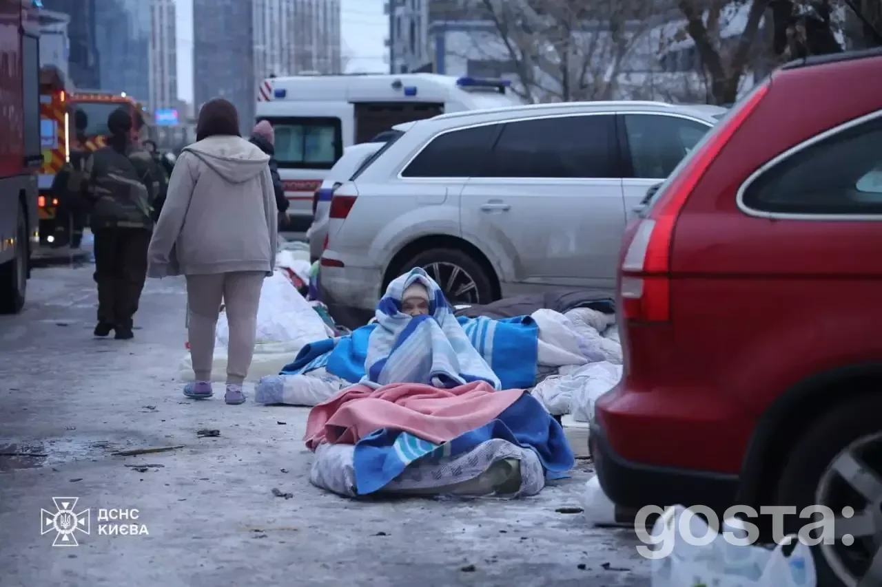 Emergency responders in Kyiv assist victims of a Russian attack, with casualties and damage reported in several areas.