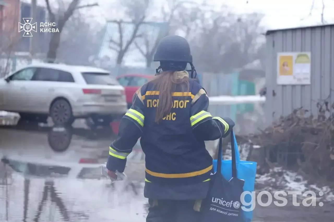 Emergency responders in Kyiv tackle aftermath of Russian attacks, battling fires and aiding injured civilians.