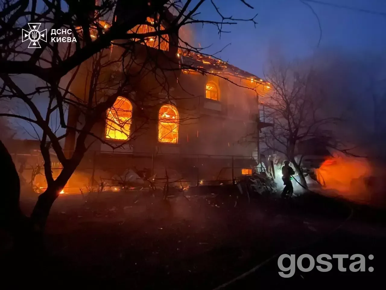 Emergency responders tackle fires and damage from a Russian attack in Kyiv, highlighting the aftermath of the devastatin