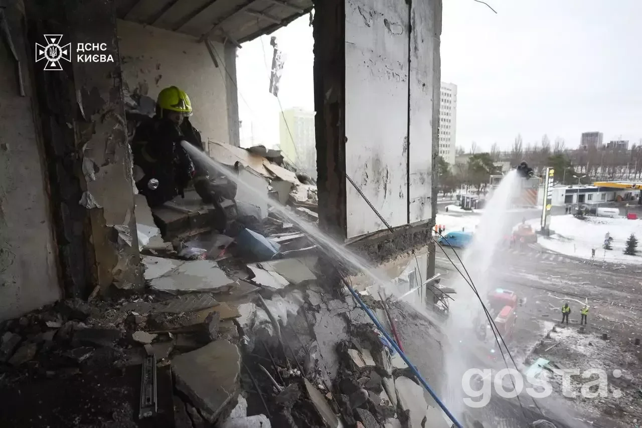 Rescue workers extinguish fires and assess damage from Russian attacks in Kyiv, highlighting the impact of ongoing confl